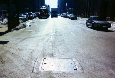 Manhole antenna in street
